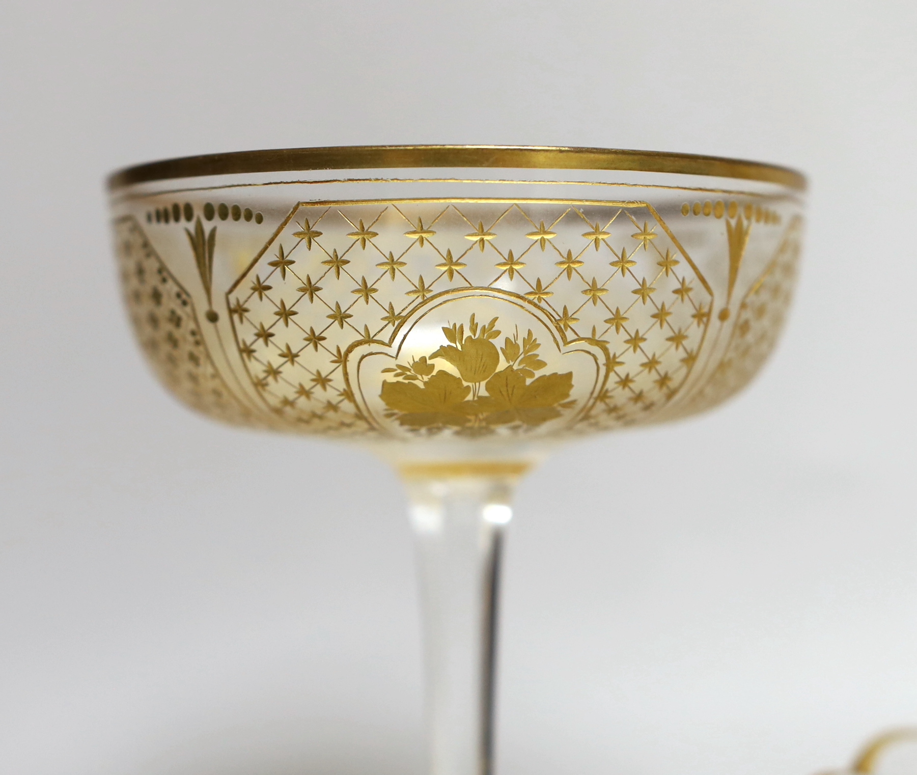 A group of gilded wheel engraved Bohemian table glass